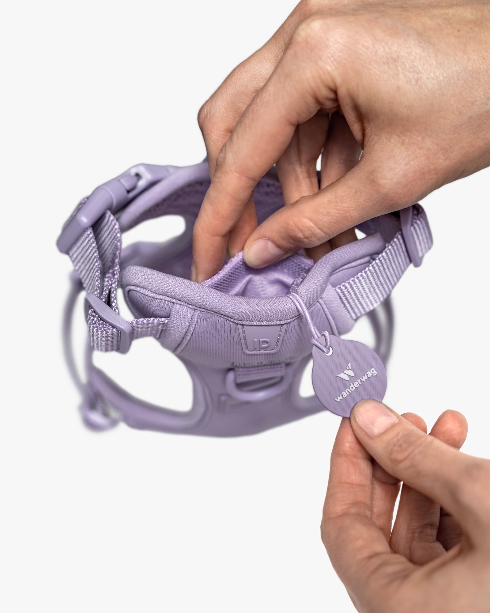 hands showcasing the ID tag pocket